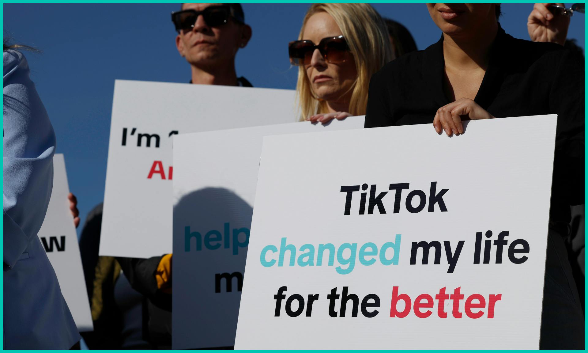 Participants hold signs in support of TikTok at a news conference outside the U.S. Capitol Building on March 12, 2024 in Washington, DC.
