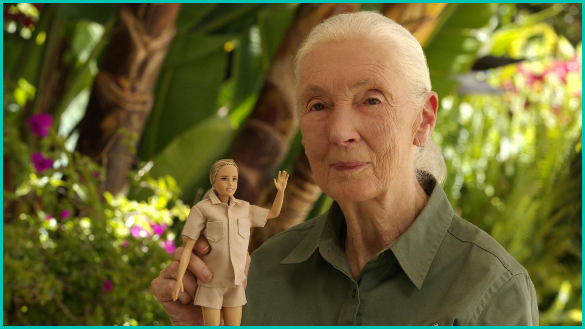 Jane Goodall posing with Barbie.
