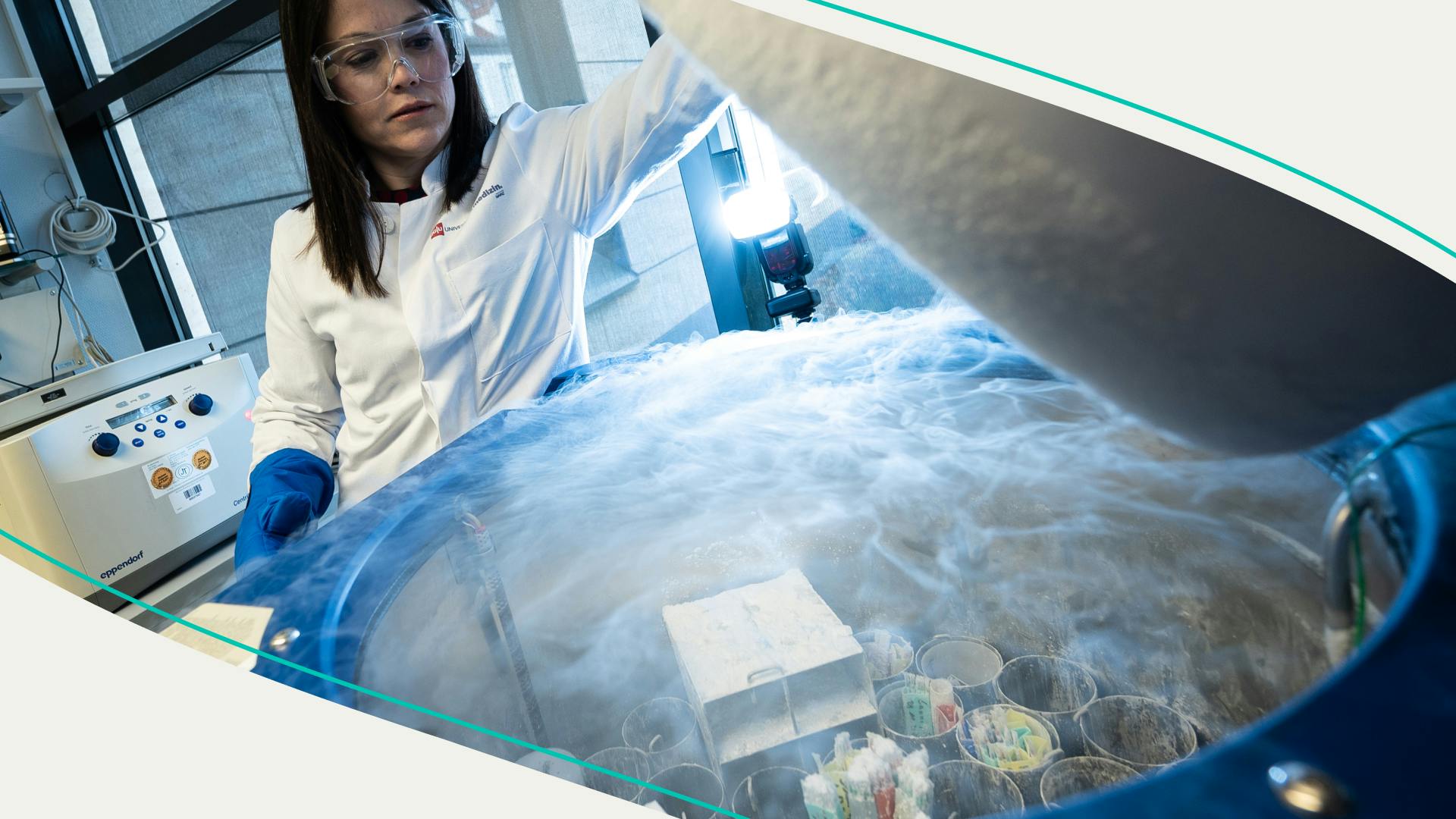 Ruth Gomez, Reproductive Medicine Specialist Head of the Mainz Fertility and PID Centre, stands at a cryotank with frozen sperm and embryos at certain stages.