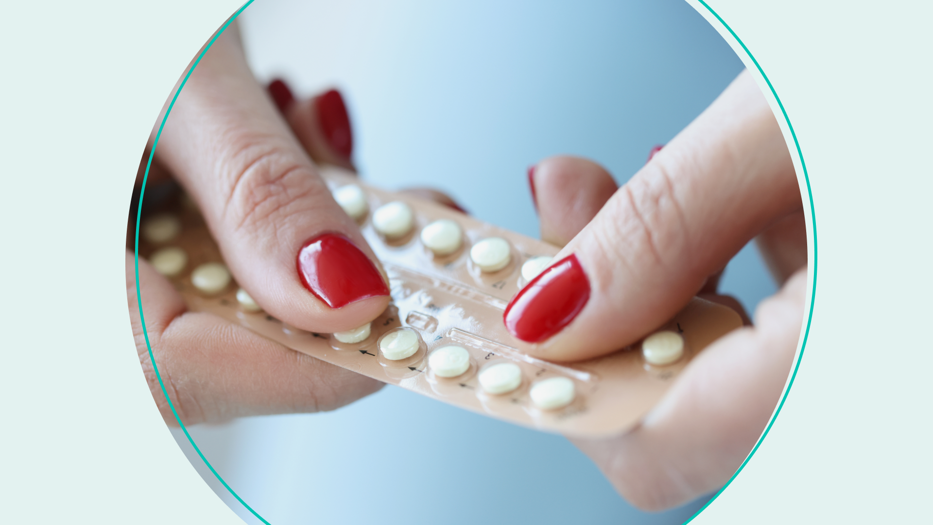 Woman holds pack of hormonal contraceptive birth control