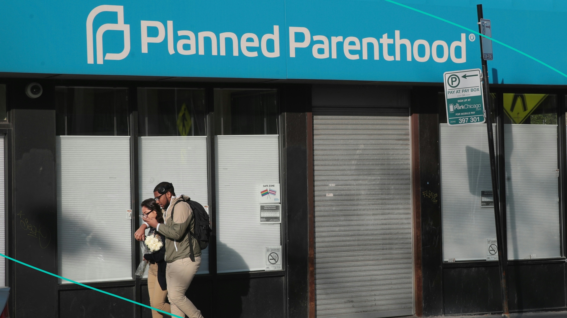 Two pedestrians walk by the Planned Parenthood clinic in Chicago, Illinois