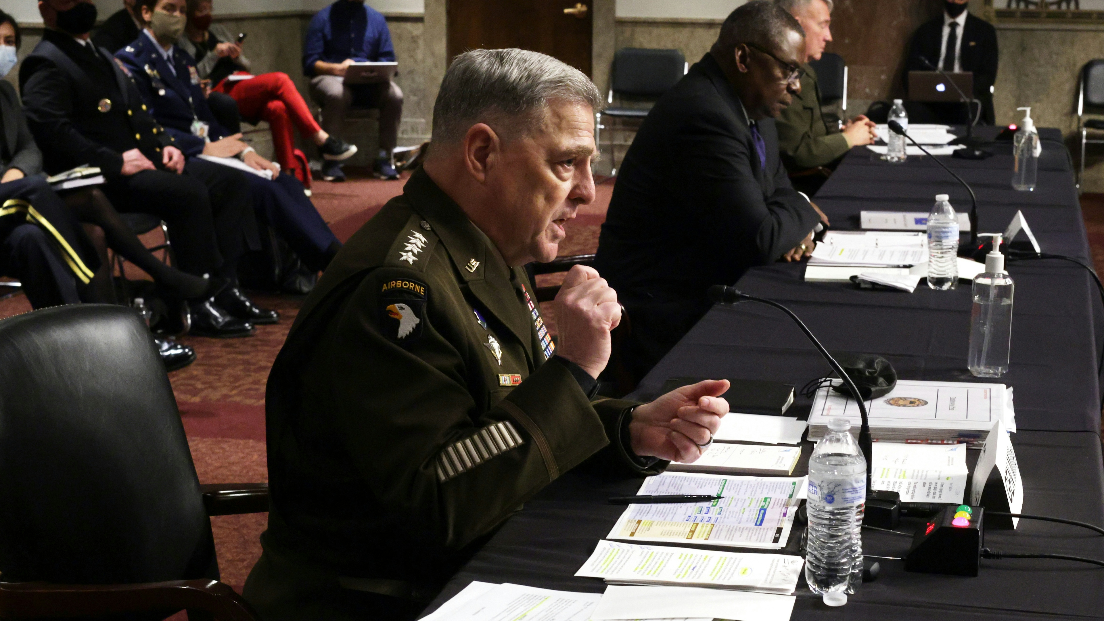 U.S. Secretary of Defense Lloyd Austin (C) Chairman of the Joint Chiefs of Staff Gen. Mark Milley (L) and Commander of U.S. Central Command Gen. Kenneth McKenzie (R) testify during a hearing before Senate