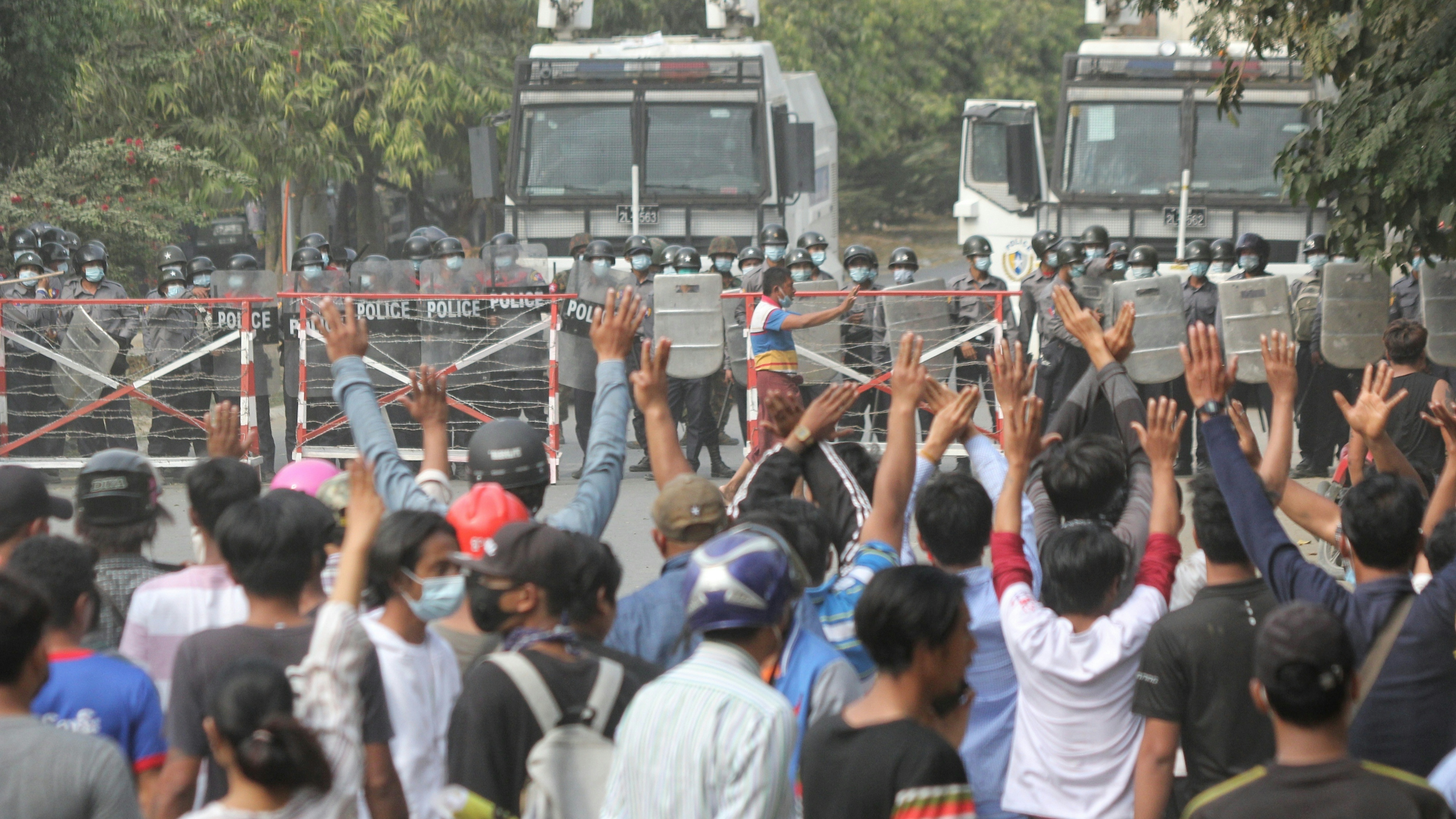 Protesters chant slogans during an anti-coup protests continue in Mandalay, Myanmar on February 20, 2021.