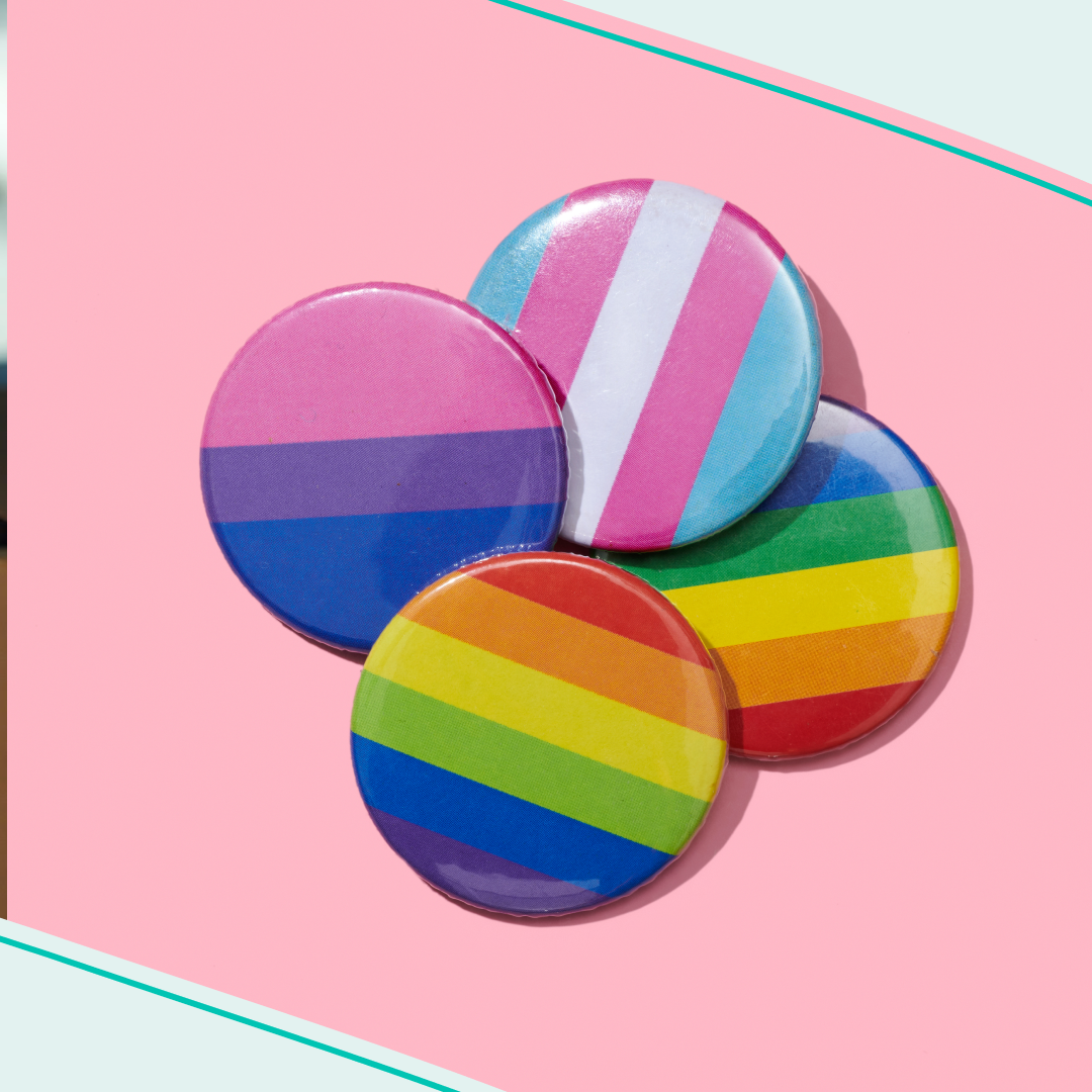 A picture of different buttons representing the LGBTQIA+ community